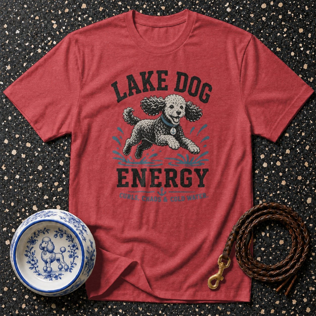 Red t-shirt with "Lake Dog Energy" text and a poodle jumping through water.