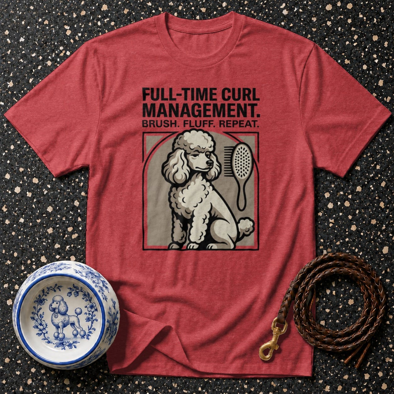 Red t-shirt with poodle design and text "FULL-TIME CURL MANAGEMENT. BRUSH. FLUFF. REPEAT."