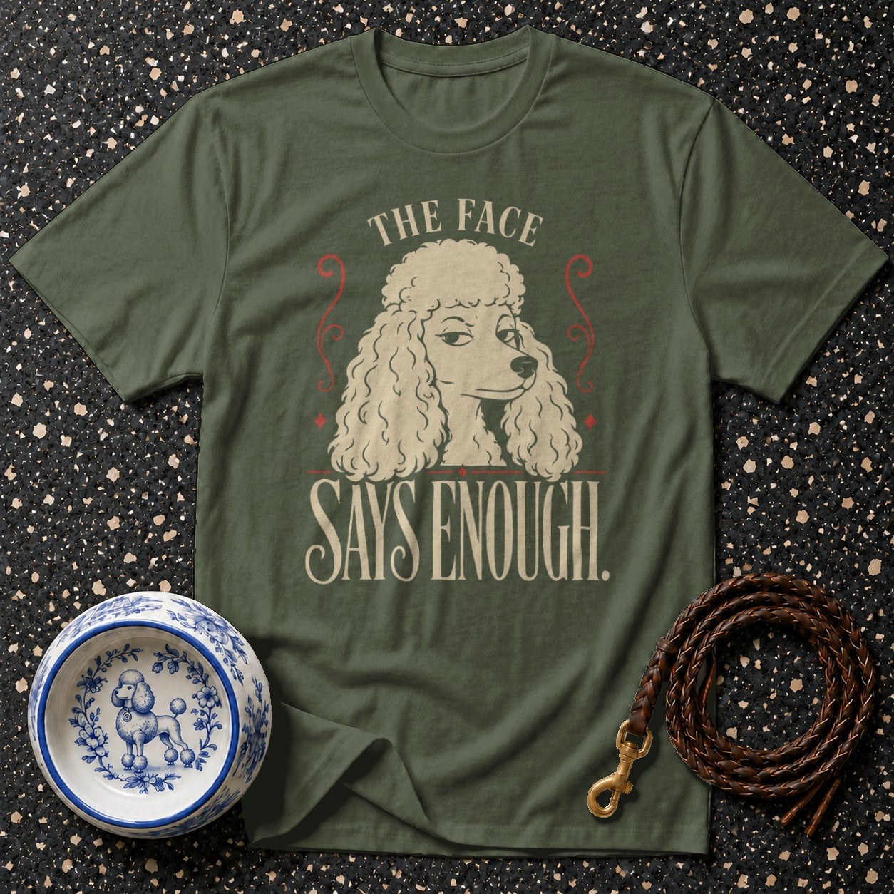 Green t-shirt with a poodle graphic and the text "THE FACE SAYS ENOUGH."
