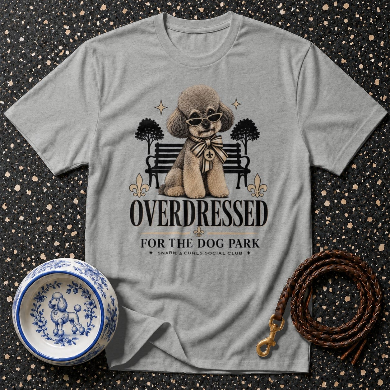 Grey t-shirt with a poodle wearing sunglasses and a bow tie, text reads "OVERDRESSED FOR THE DOG PARK".