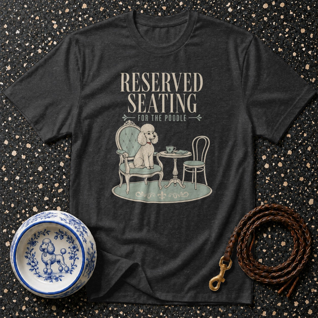Dark grey t-shirt with "RESERVED SEATING FOR THE POODLE" text and poodle illustration.