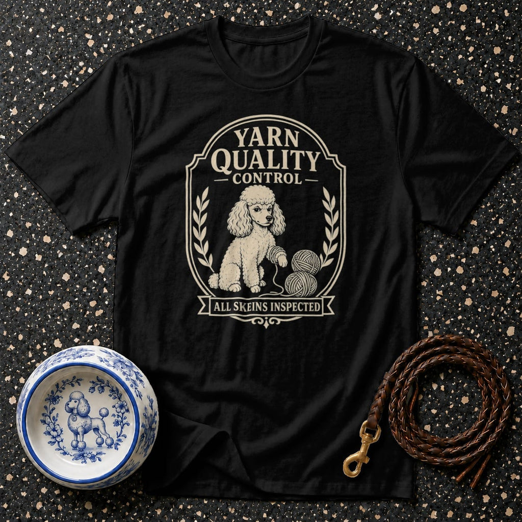 Black t-shirt with a poodle and yarn graphic reading "Yarn Quality Control".
