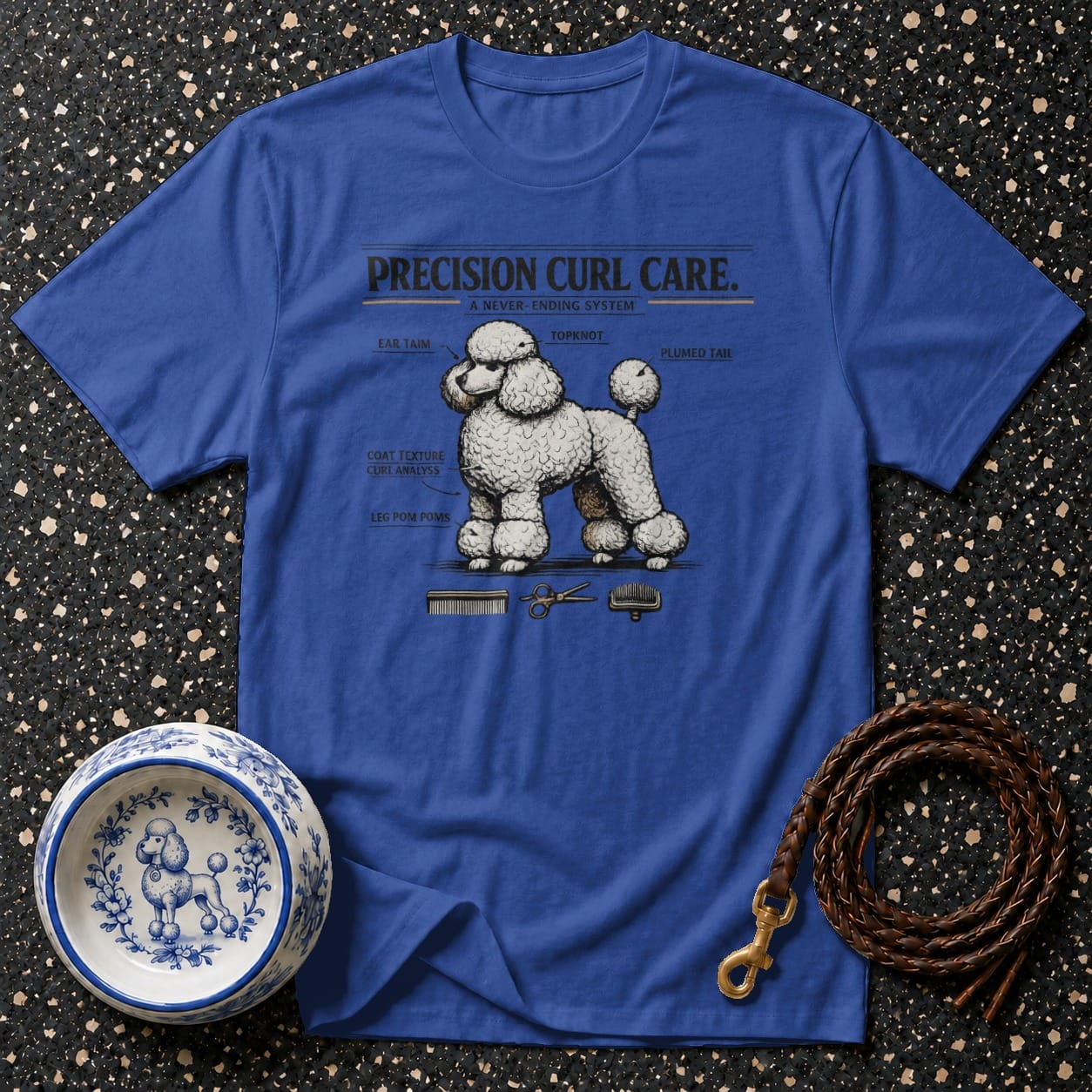 Blue t-shirt with diagram of a poodle labeled "PRECISION CURL CARE".