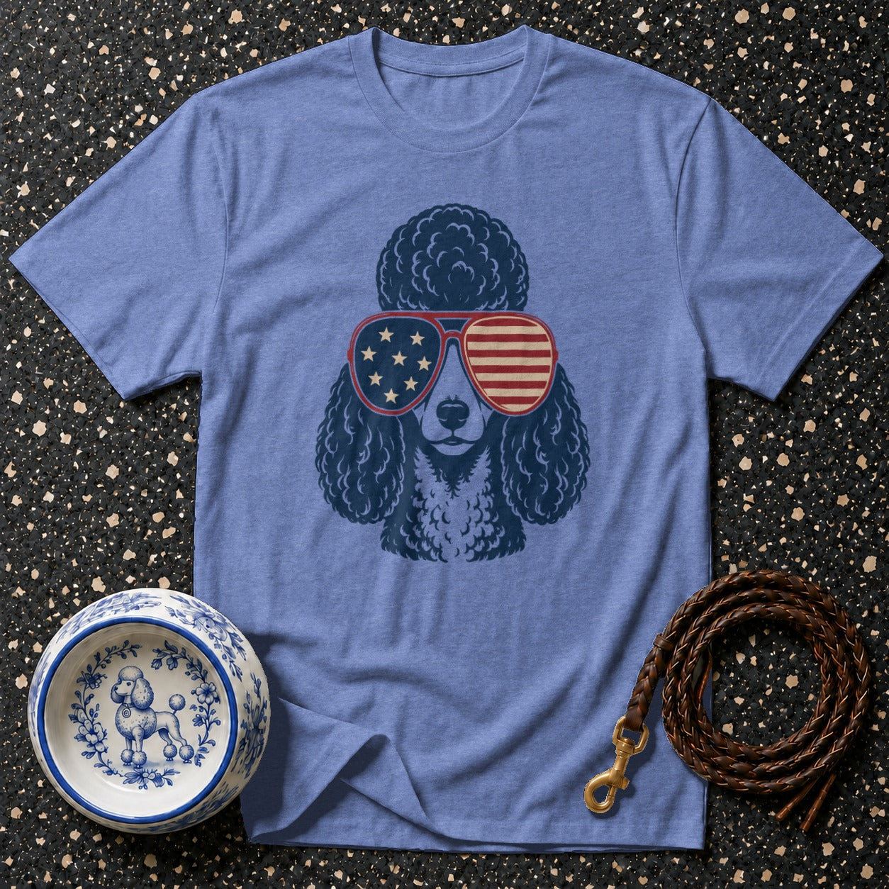 Blue t-shirt with a poodle wearing American flag sunglasses.