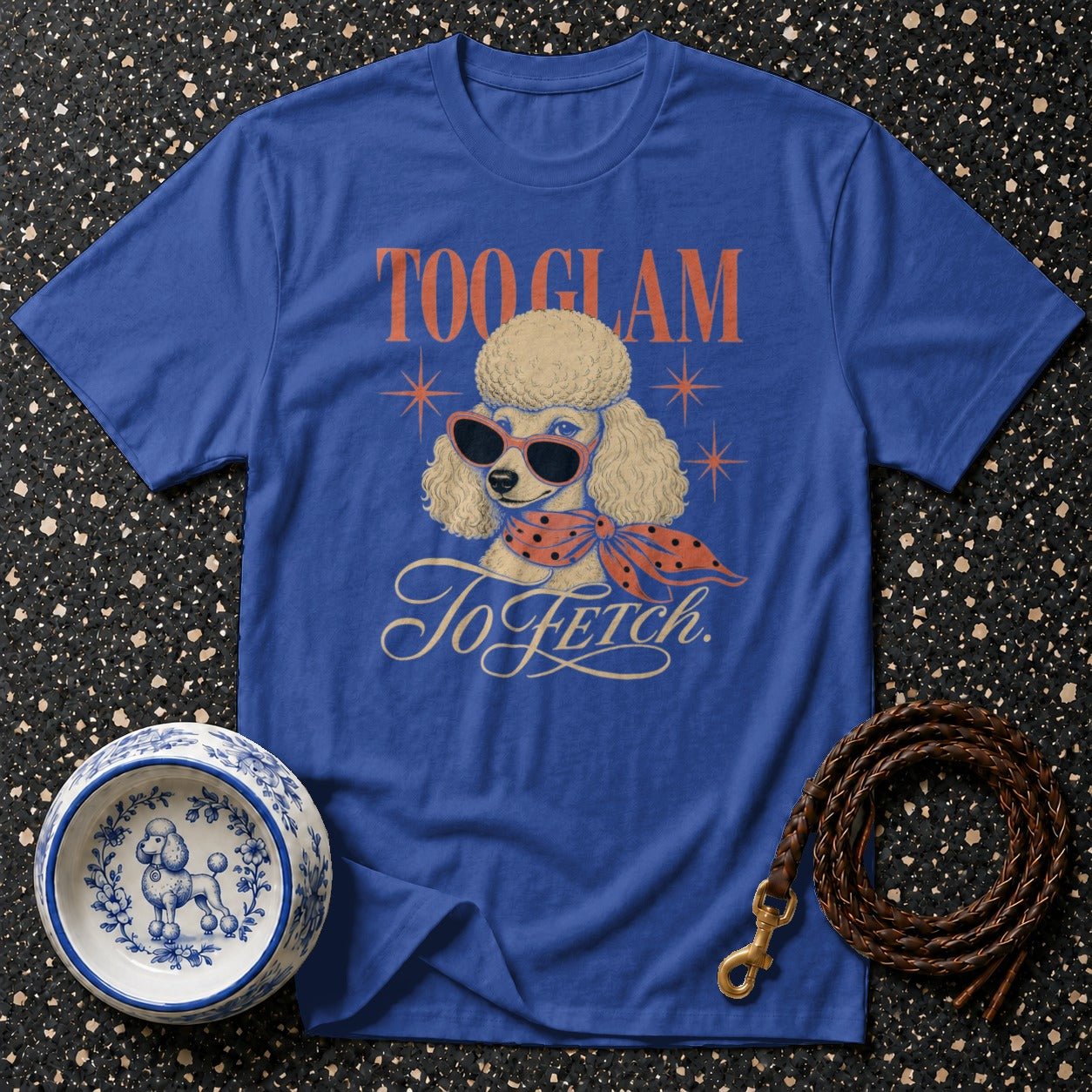 Blue t-shirt with poodle graphic and "Too Glam to Fetch" text.