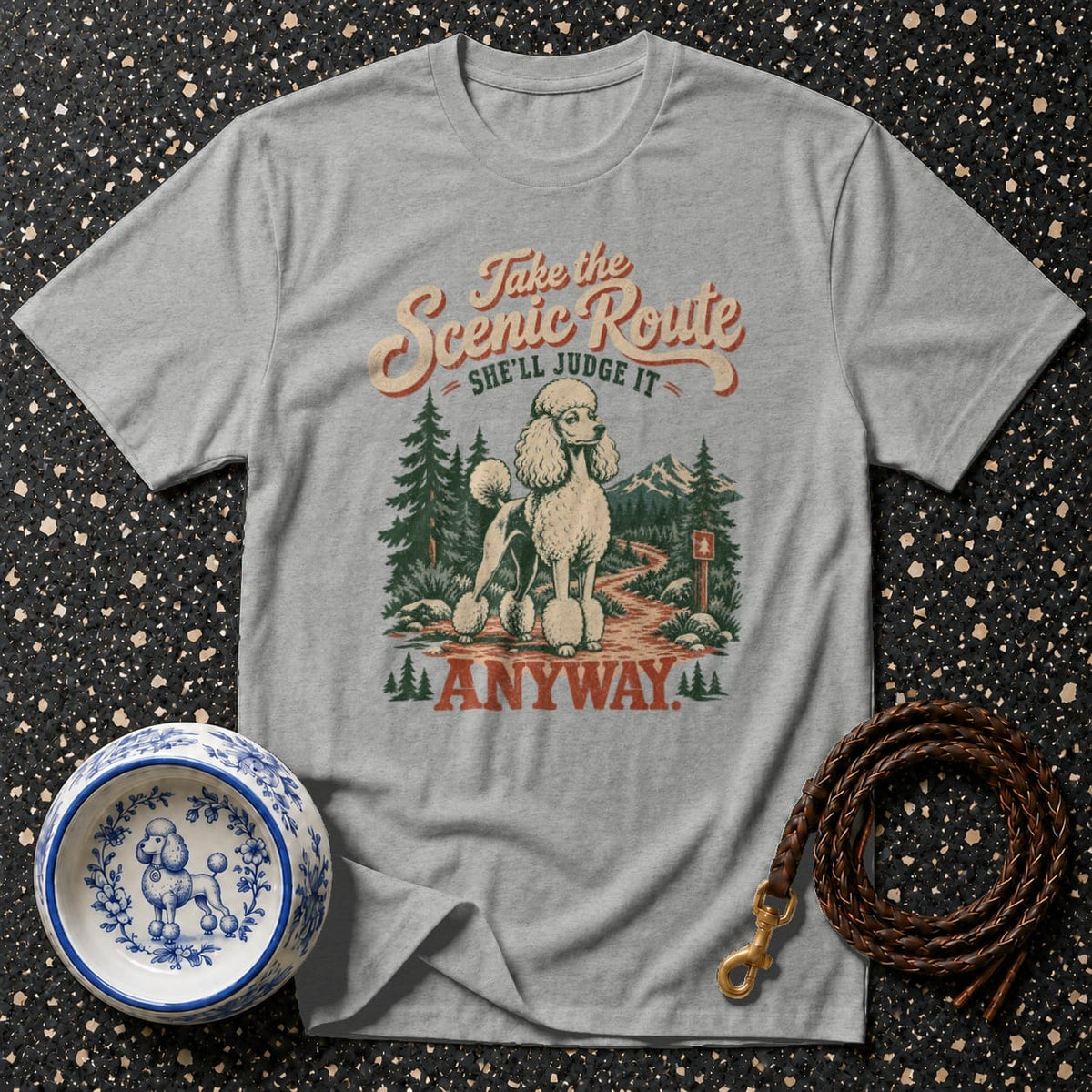 Grey t-shirt graphic of poodle on scenic route with text "Take the Scenic Route She'll Judge It Anyway".