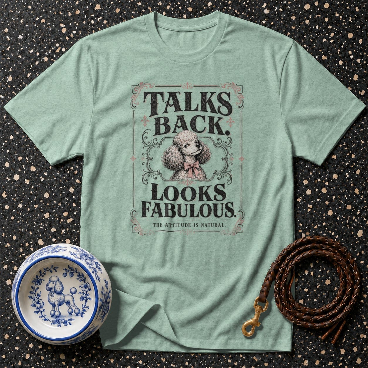 Light mint t-shirt with text "TALKS BACK. LOOKS FABULOUS." and poodle graphic.