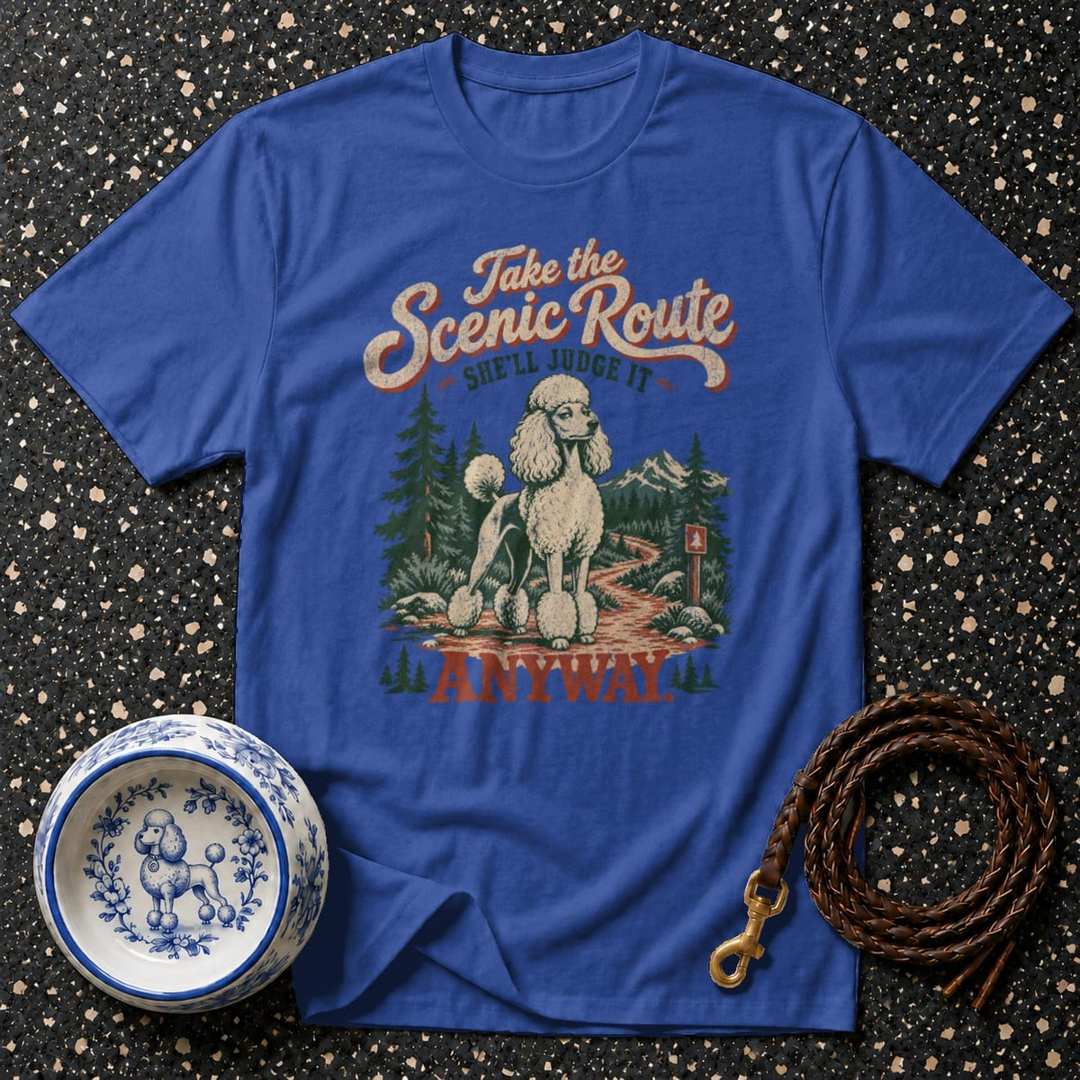 Blue t-shirt with poodle on scenic route design and text "Take the Scenic Route She'll Judge It Anyway".