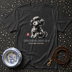 Dark grey t-shirt with a black and white poodle graphic and text: "RAISES QUESTIONS. IGNORES RULES."