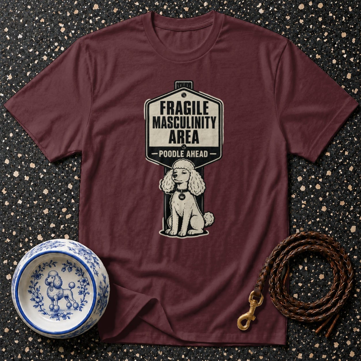 Maroon t-shirt with "Fragile Masculinity Area - Poodle Ahead" graphic and poodle illustration.