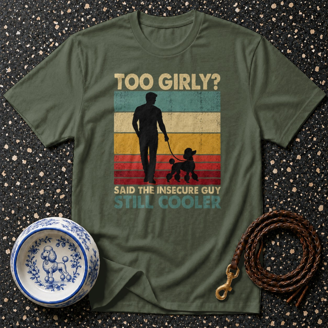 Green t-shirt with "Too Girly? Said the Insecure Guy Still Cooler" text and poodle graphic.
