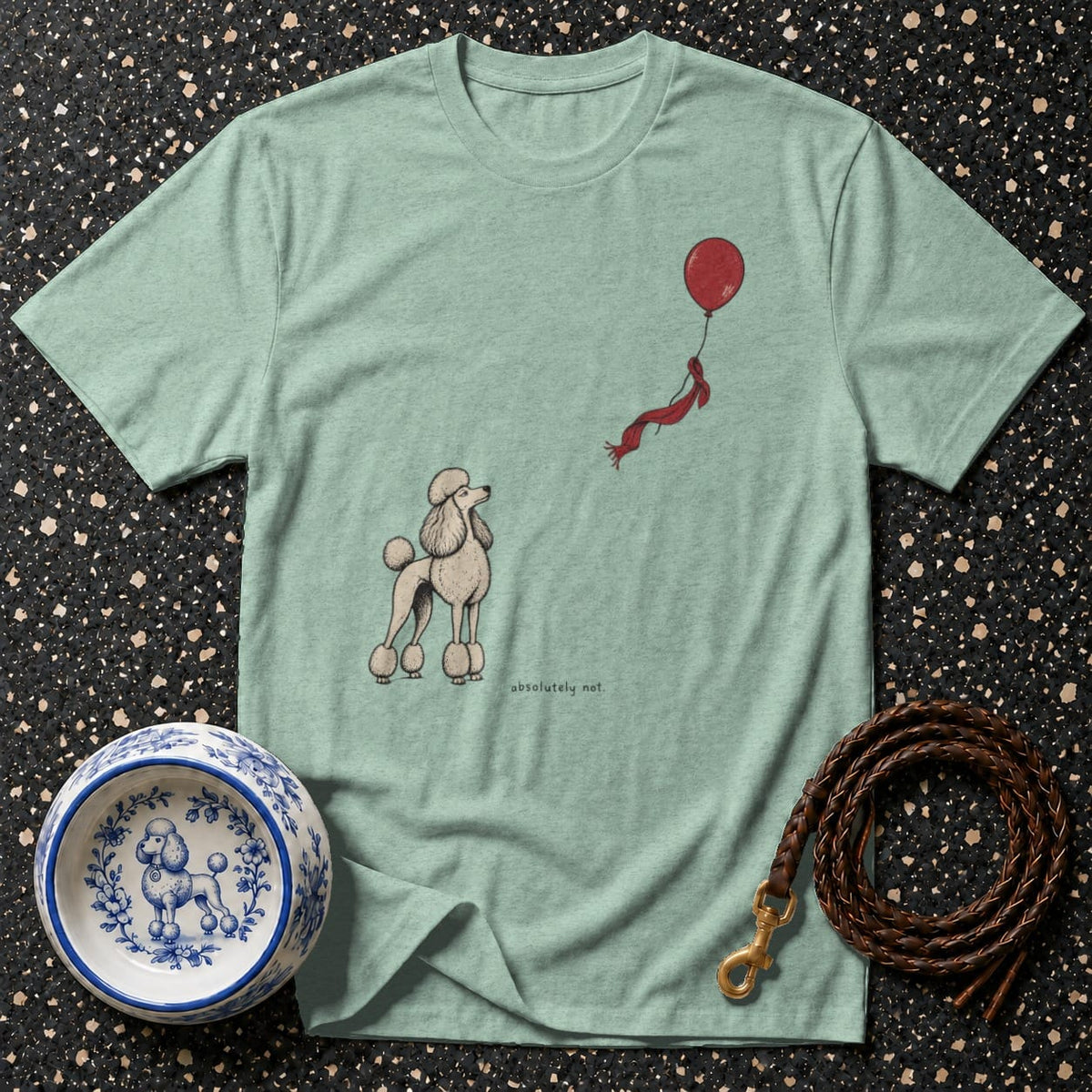 Light teal t-shirt with poodle illustration and text "absolutely not."