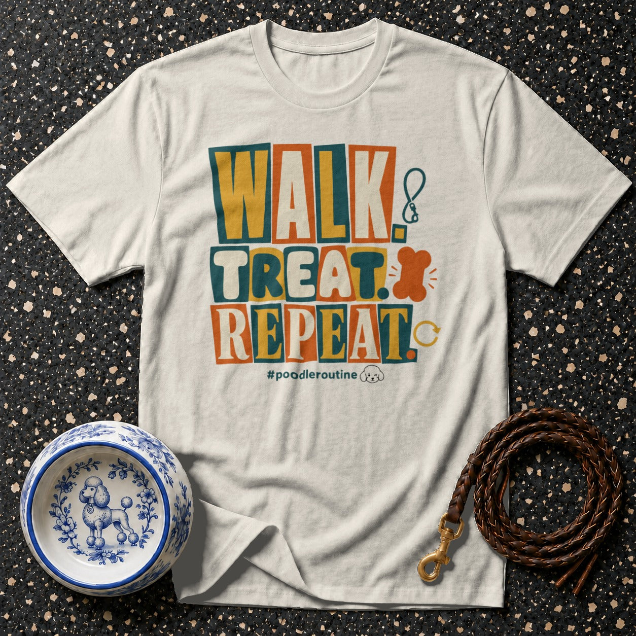 Cream t-shirt with "WALK TREAT REPEAT #poodleroutine" text and poodle icons.