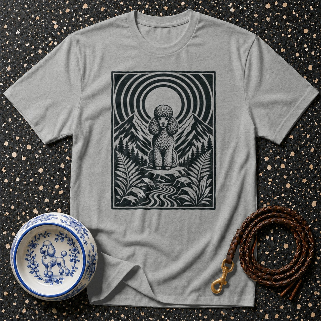 Grey t-shirt featuring a black and white graphic of a poodle in a mountain landscape.
