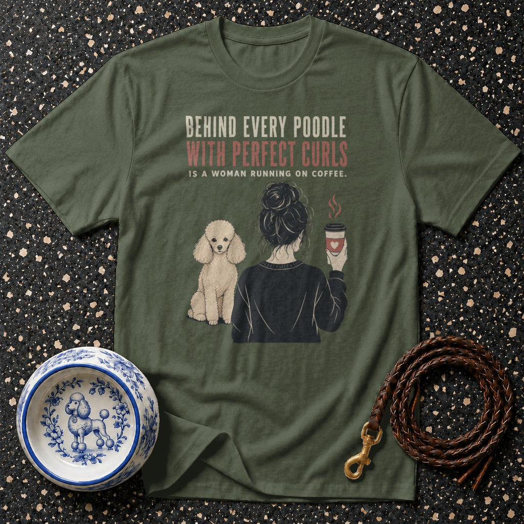 Green t-shirt graphic: poodle, woman with coffee, and text "Behind Every Poodle With Perfect Curls is A Woman Running On Coffee."