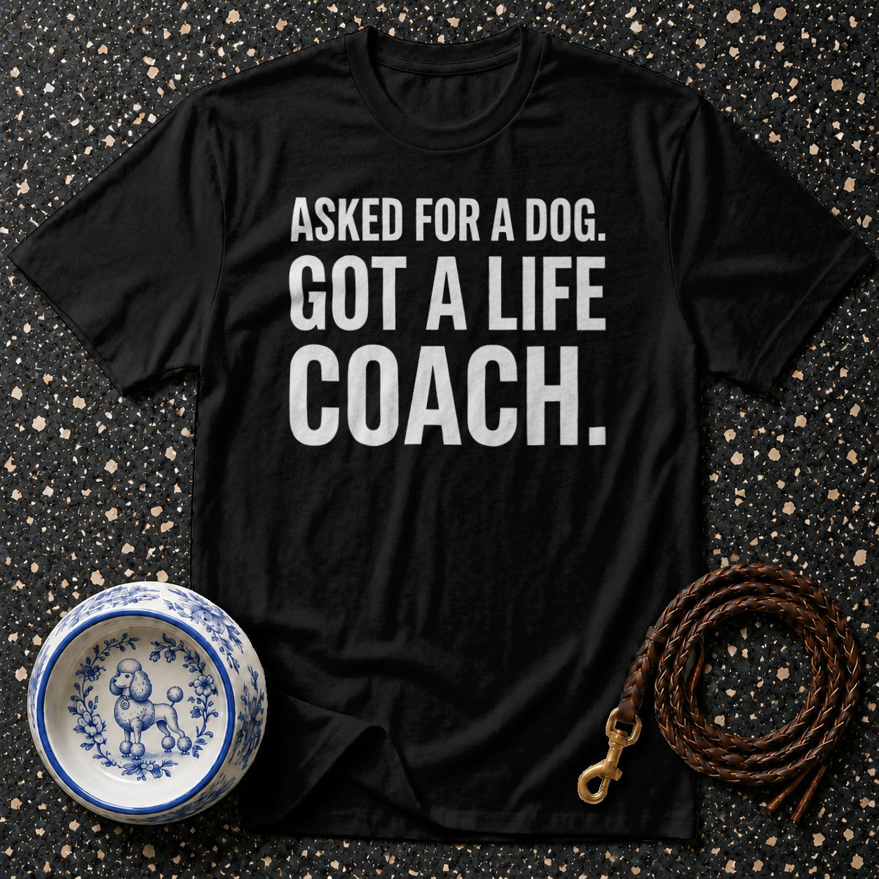 Black t-shirt with white text "ASKED FOR A DOG. GOT A LIFE COACH."