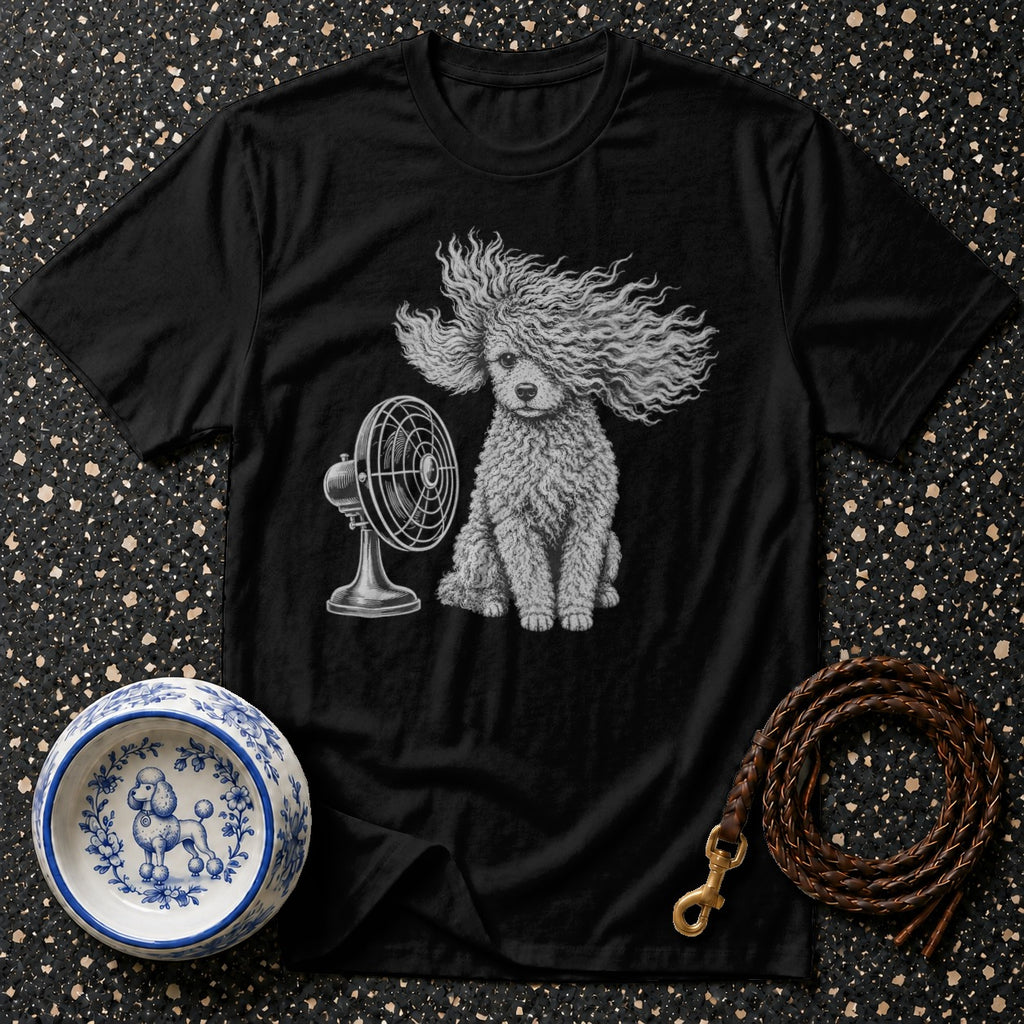 Black t-shirt with a poodle sitting by a fan and a braided leash and bowl.