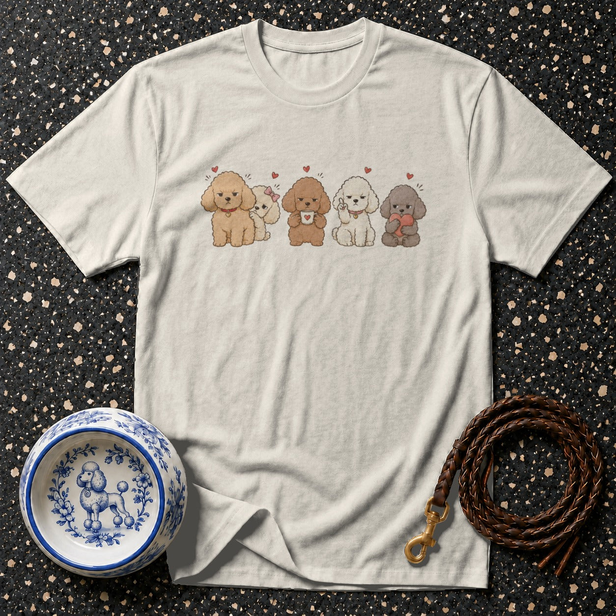 T-shirt with five cartoon poodles holding a mug and a heart.