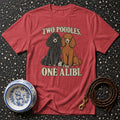 Red t-shirt with illustration of two poodles and text "Two Poodles. One Alibi."