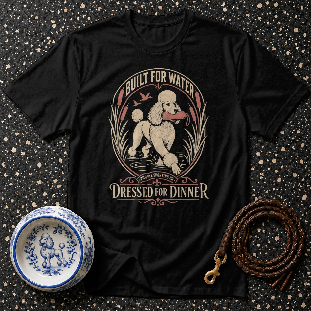 Black t-shirt with "Built for Water Dressed for Dinner" text and poodle graphic.