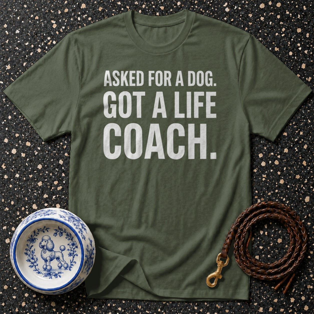 Green t-shirt with white text "ASKED FOR A DOG. GOT A LIFE COACH."
