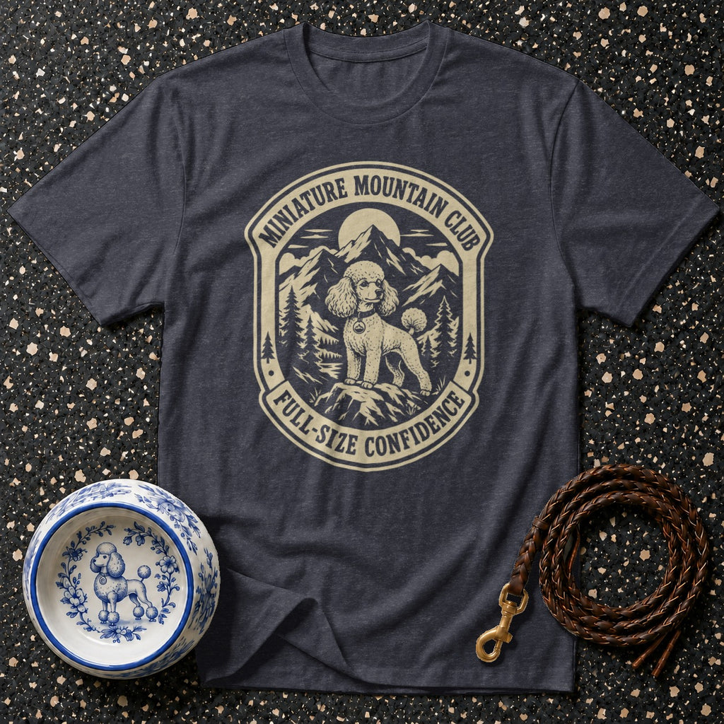 T-shirt with "Miniature Mountain Club" logo featuring a poodle in a mountain landscape.