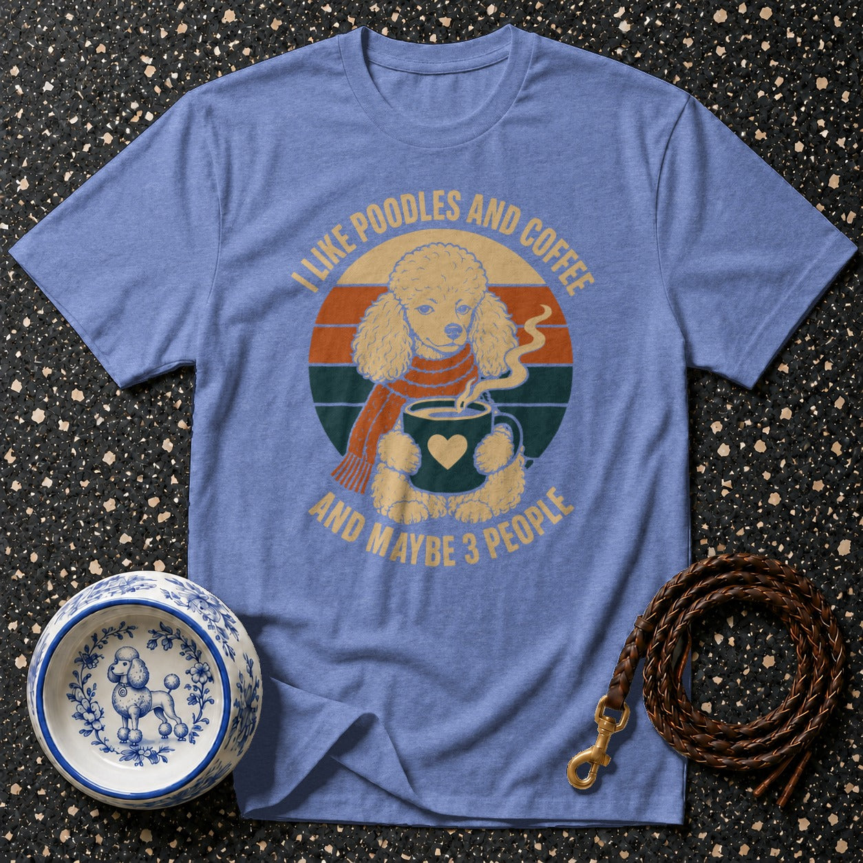 Blue t-shirt with poodle and coffee graphic and text.