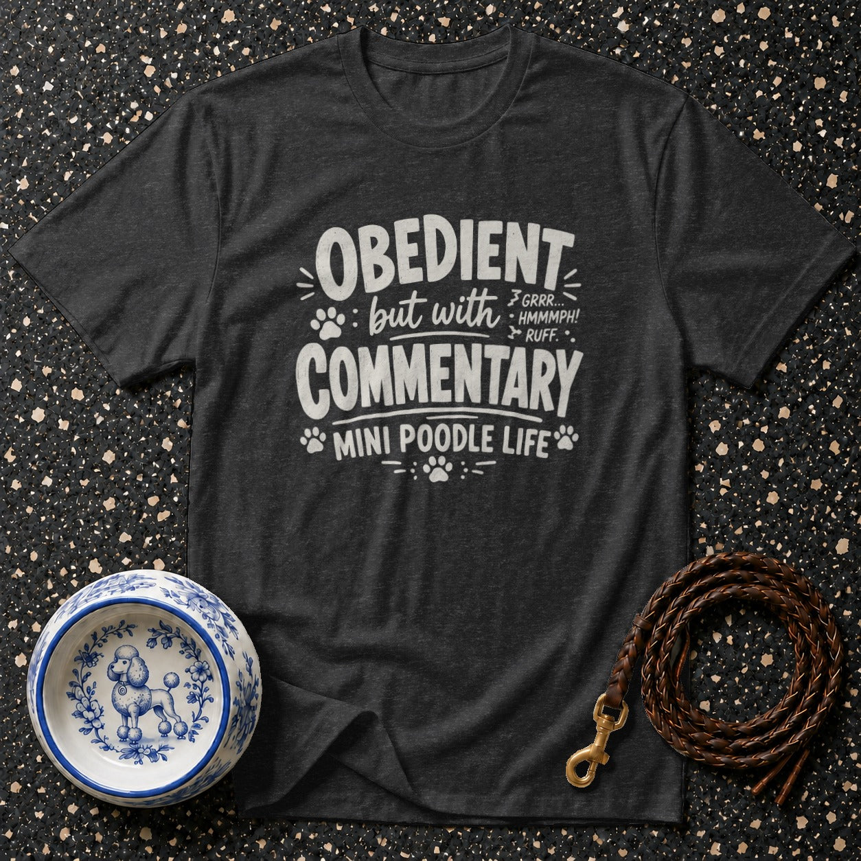 Dark t-shirt with text "Obedient but with commentary mini poodle life".