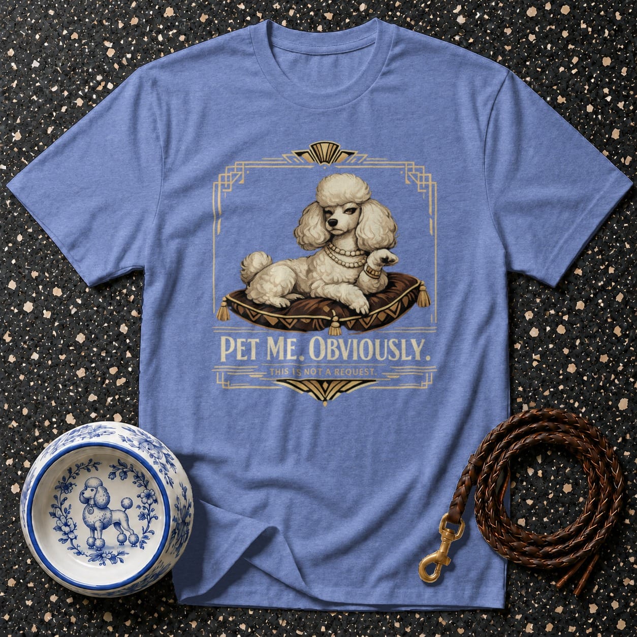 Blue t-shirt with fluffy white poodle graphic and the text "PET ME. OBVIOUSLY."