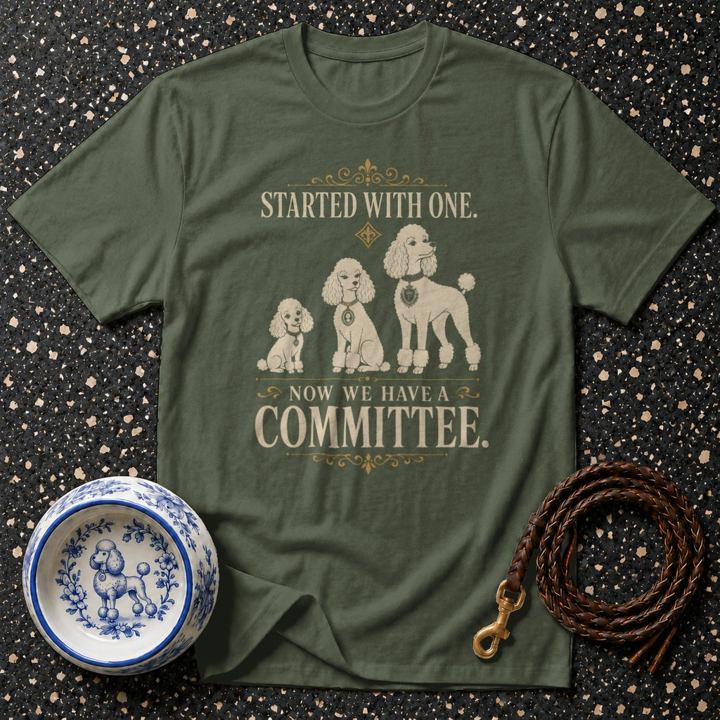 Green t-shirt with poodles and text "STARTED WITH ONE. NOW WE HAVE A COMMITTEE."