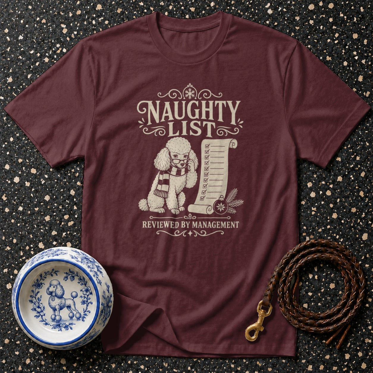 Maroon t-shirt with "Naughty List Reviewed By Management" and poodle graphic.