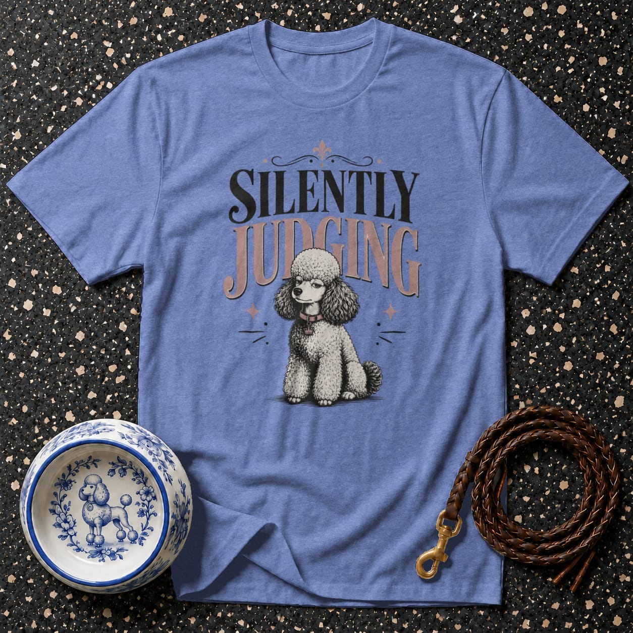 Blue t-shirt with a poodle and the text "Silently Judging".