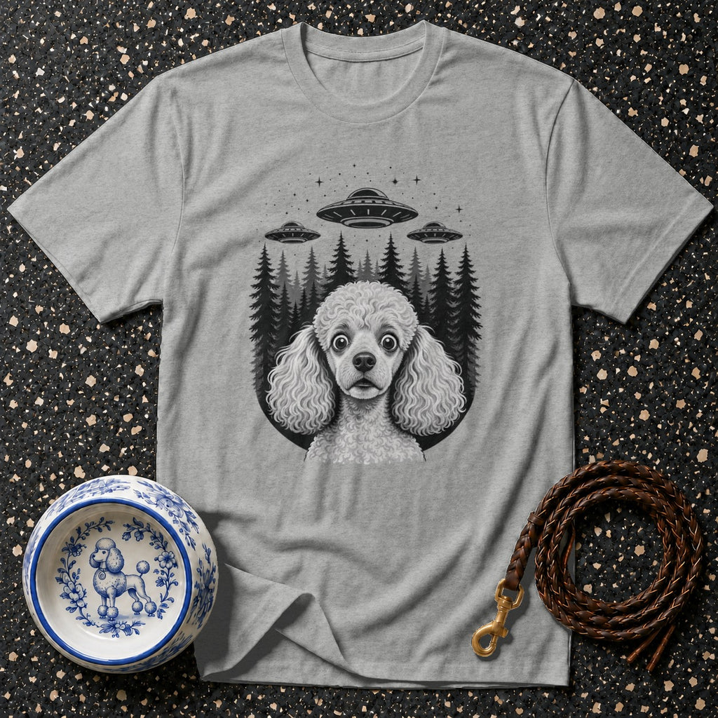Grey t-shirt with a Poodle's face amid UFOs and dark trees.