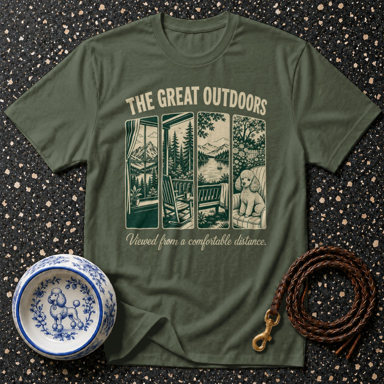 Olive green t-shirt with "The Great Outdoors" graphic featuring porch scenes and a poodle.