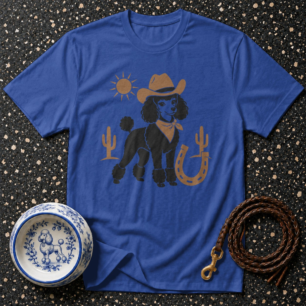 Blue t-shirt with a black poodle wearing a cowboy hat and bandana, western graphics.