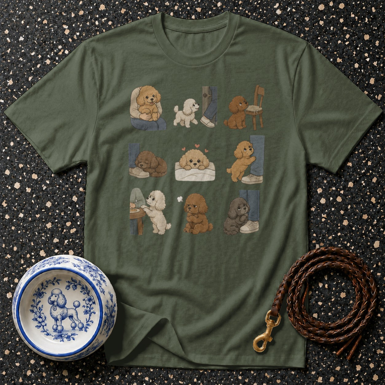 Olive green t-shirt with a grid of cartoon poodles in various poses.