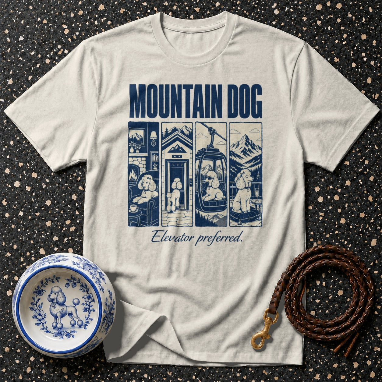 Light cream t-shirt with "MOUNTAIN DOG" text and poodle illustrations in four panels.
