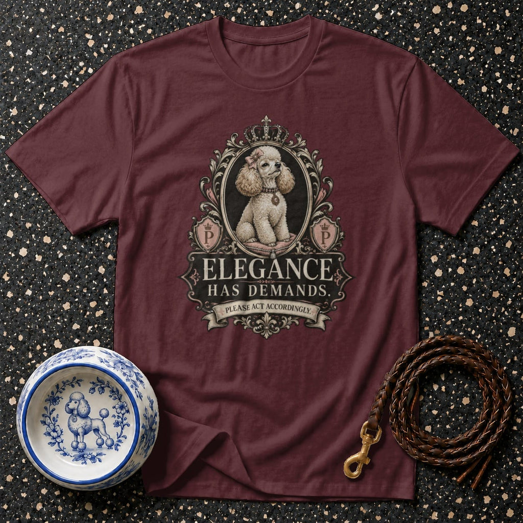 Maroon t-shirt with a framed poodle graphic and the text "ELEGANCE HAS DEMANDS."