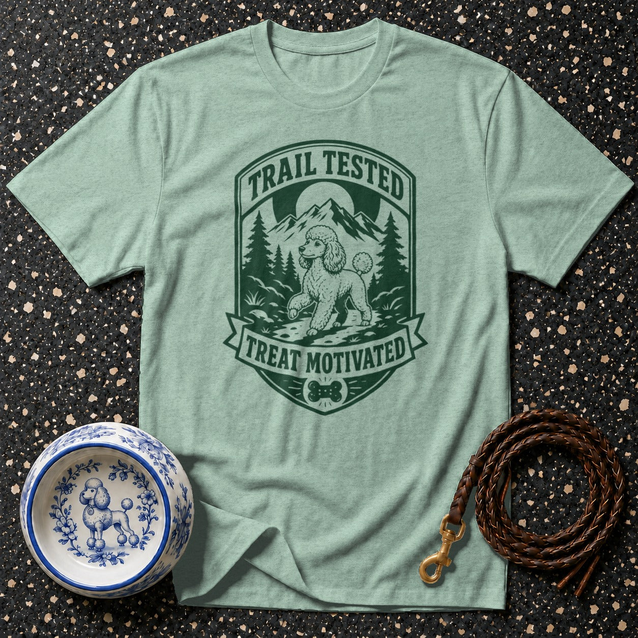 Light green t-shirt with "Trail Tested, Treat Motivated" graphic featuring a poodle.