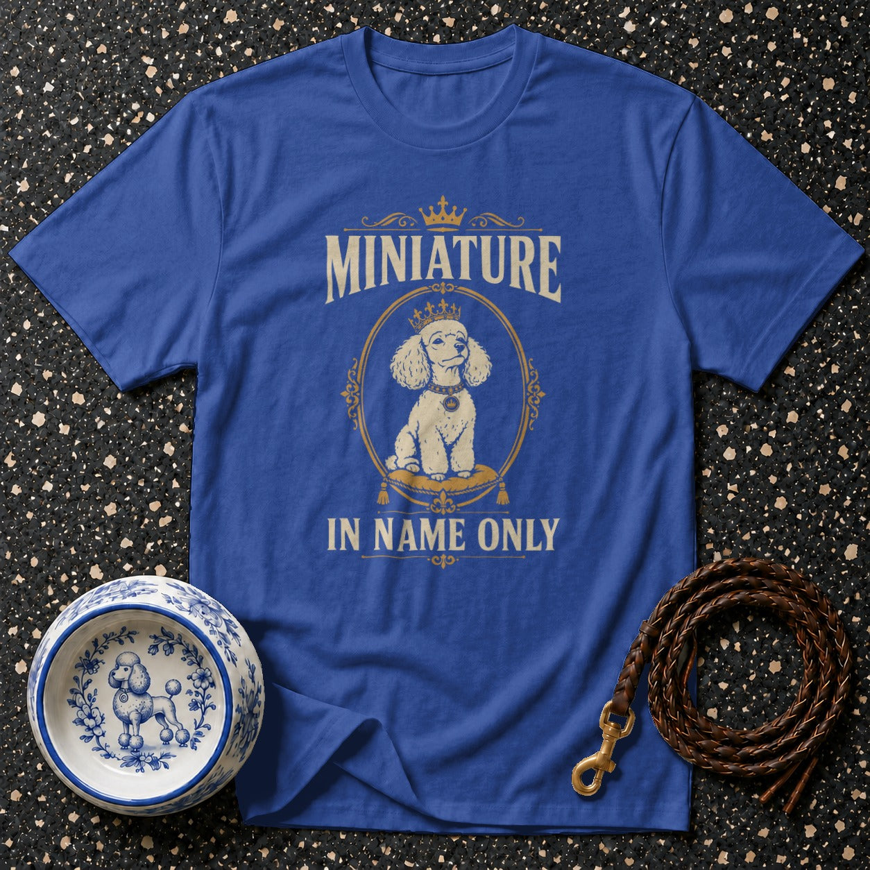 Blue t-shirt with "MINIATURE IN NAME ONLY" and a poodle graphic.