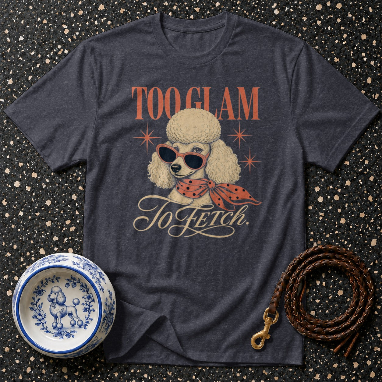 Dark t-shirt with poodle graphic and "Too Glam To Fetch" text.