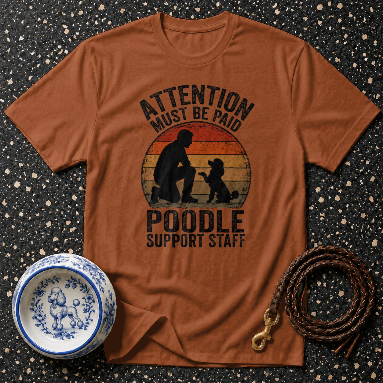 Orange t-shirt with "Attention Must Be Paid Poodle Support Staff" text and poodle graphic.