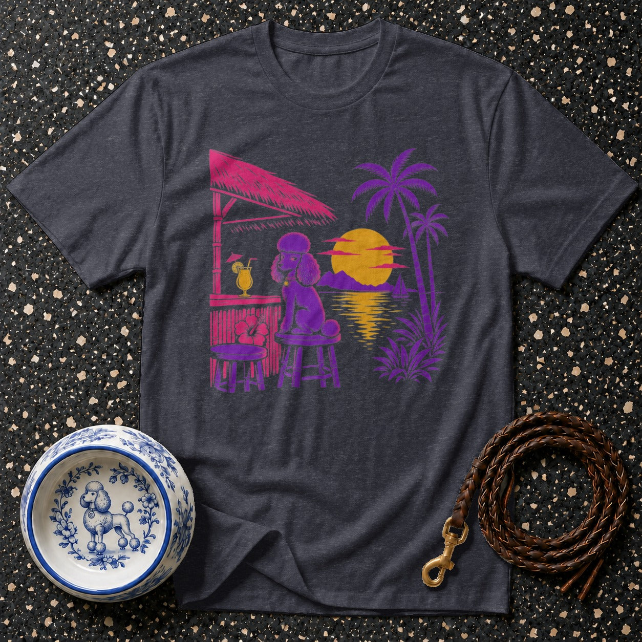 Dark t-shirt with tropical poodle bar scene graphic and poodle dog bowl.