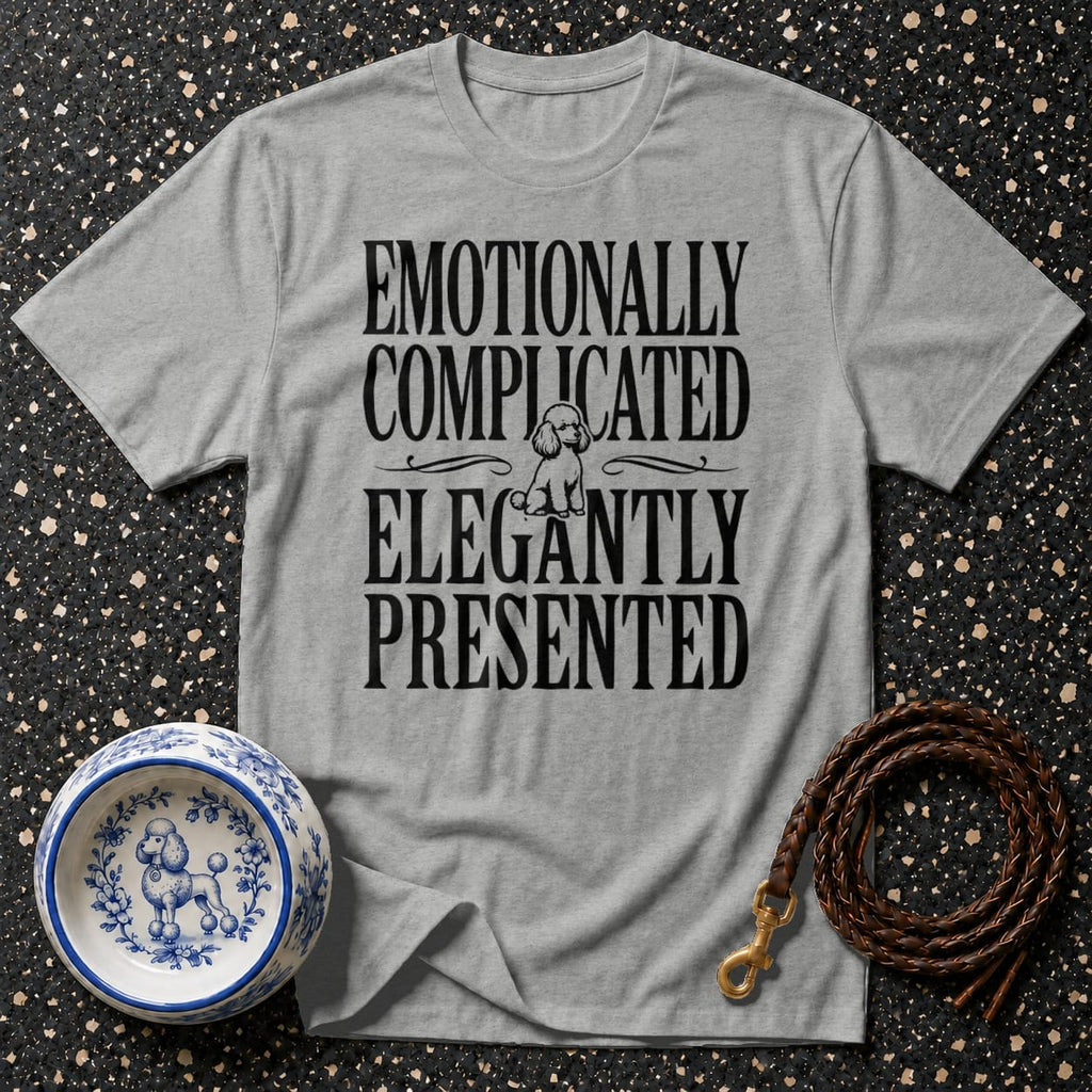Grey t-shirt with text "EMOTIONALLY COMPLICATED ELEGANTLY PRESENTED" and a poodle graphic.