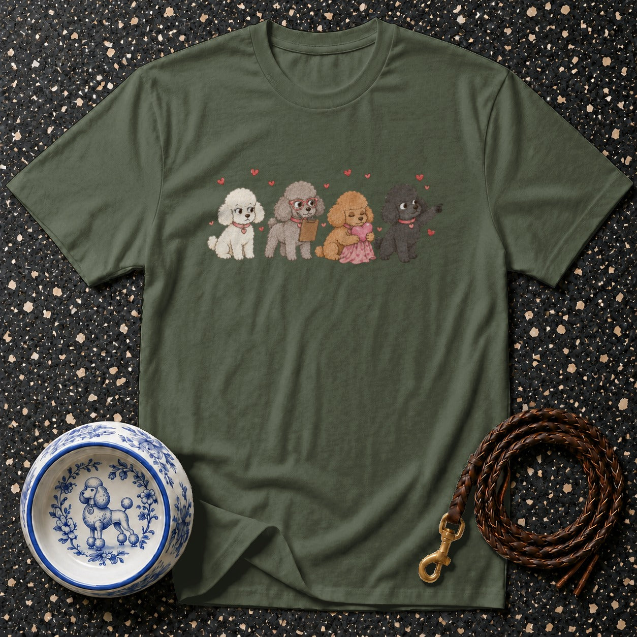 Green t-shirt with pixel art poodles and pink hearts design.