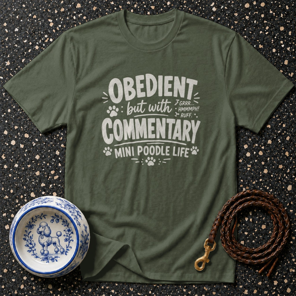Green t-shirt with white text: "Obedient but with commentary" and "Mini Poodle Life."