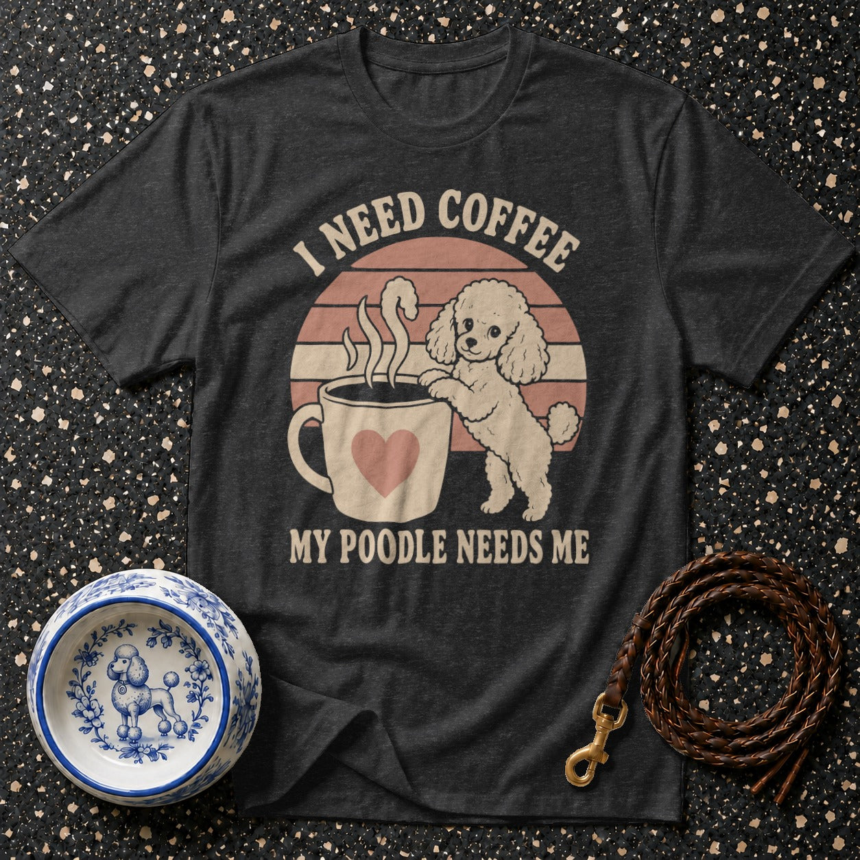 T-shirt with poodle graphic and text "I NEED COFFEE MY POODLE NEEDS ME"