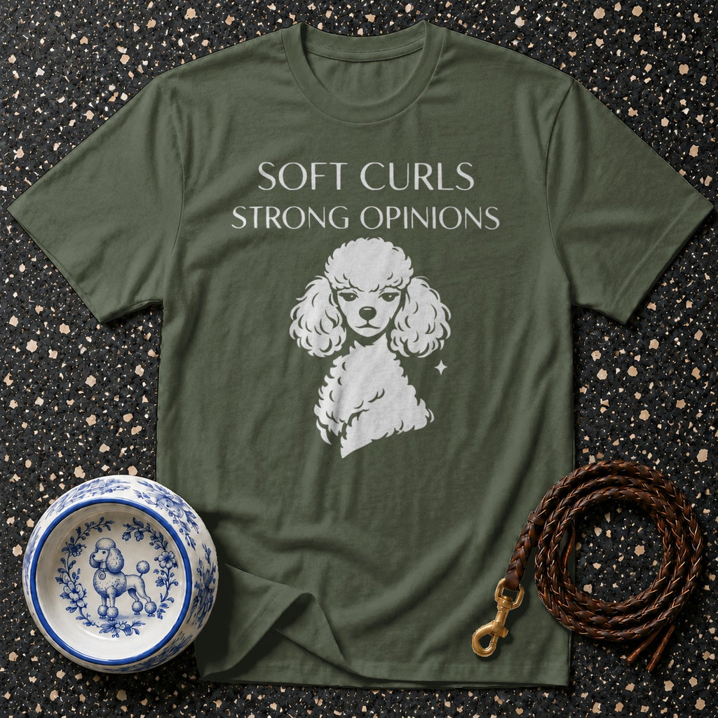 Green t-shirt with "Soft Curls Strong Opinions" and a poodle graphic.