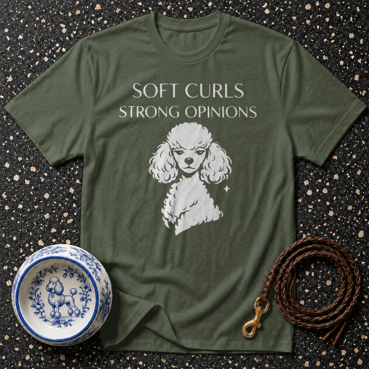 Green t-shirt with "Soft Curls Strong Opinions" and a poodle graphic.