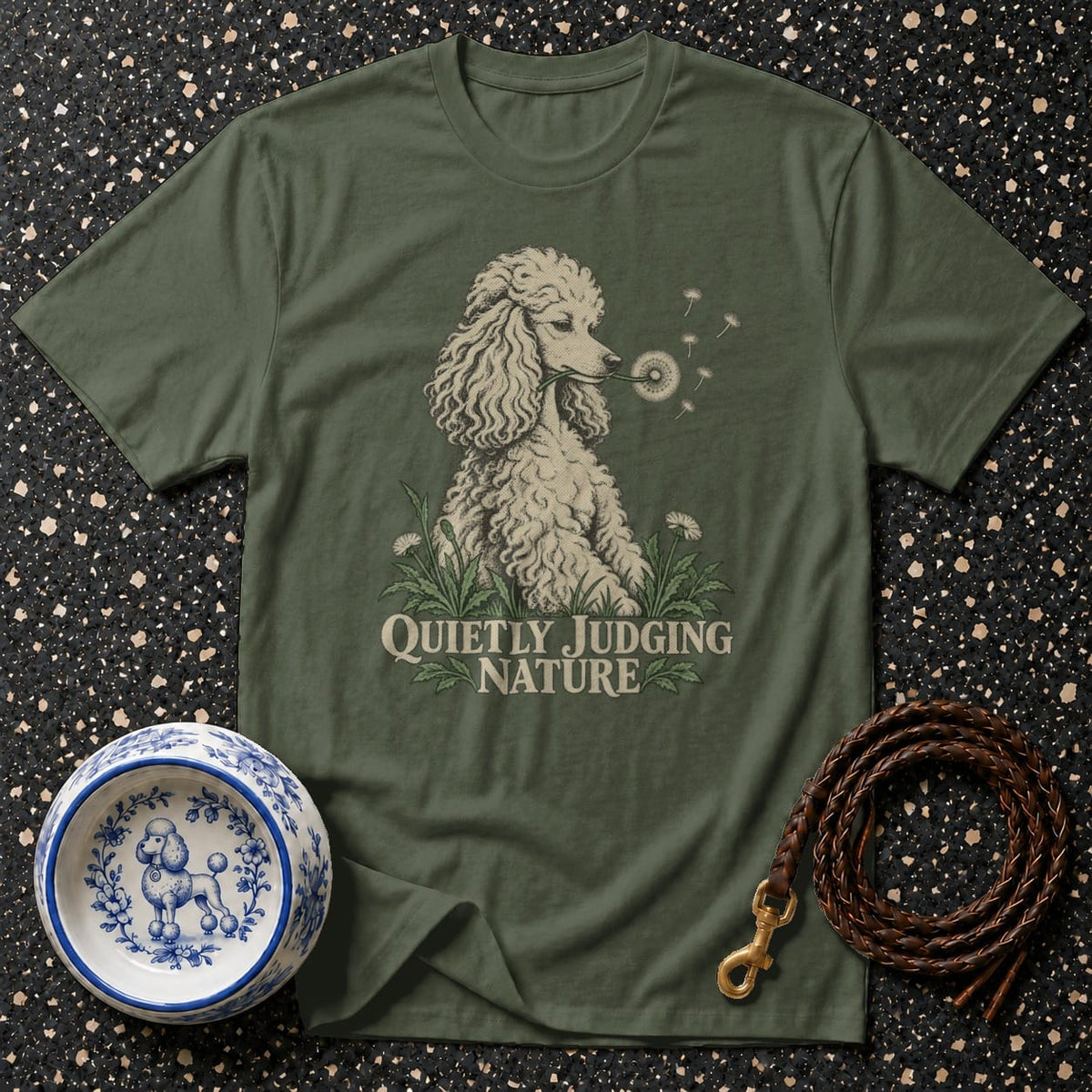 Olive t-shirt with poodle graphic and text "QUIETLY JUDGING NATURE".